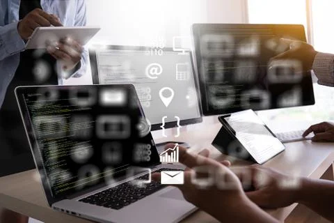 Man work Coding software developer programmer is coding on a desktop computer 스톡 사진