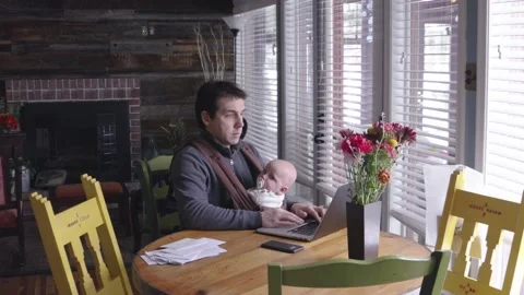 Man work from home computer with infant baby Wide 1920x1080 Silent Video stock 230042323
