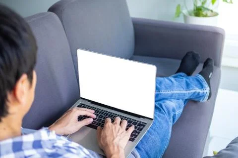 A man is work at home or studying online via computer. Businessman sit on the Foto stock