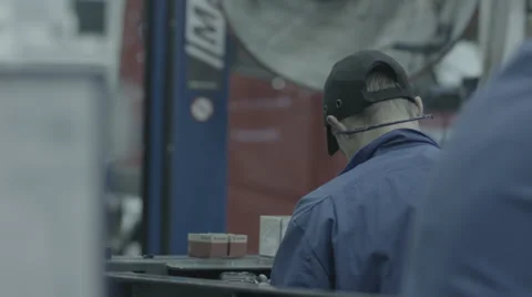Man at work. Industrial. Back Shot Stock Footage 33444359