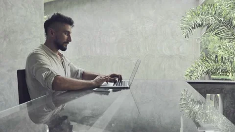 A man work at laptop Stock Footage 130363836