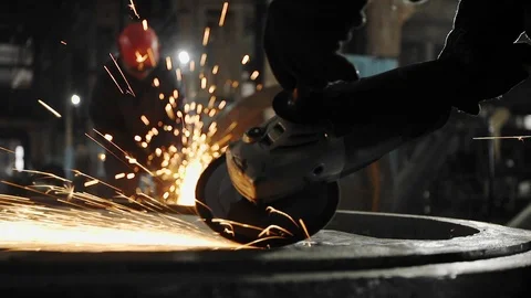 Man work with Metal processing factory. Sparks. Stock Footage 105463361