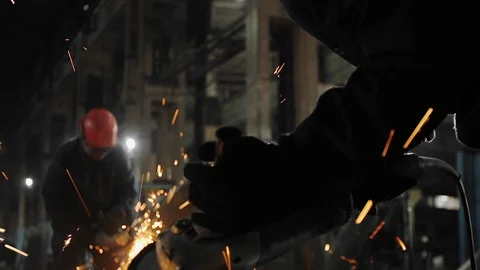Man work with Metal processing factory. Sparks. Stock Footage 105463451