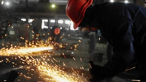 Man work with Metal processing factory. Sparks. Stock Footage 105463562