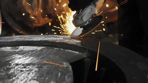 Man work with Metal processing factory. Sparks. Stock Footage 105463719