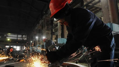 Man work with Metal processing factory. Sparks. Stock Footage 105564199