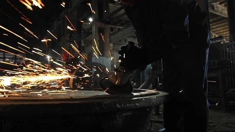 Man work with Metal processing factory. Sparks. Stock Footage 105564374