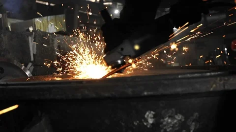 Man work with Metal processing factory. Sparks. Stock Footage 105564554