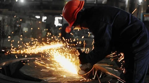 Man work with Metal processing factory. Sparks. Stock Footage 105564780