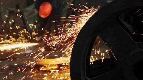 Man work with Metal processing factory. Sparks. Stock Footage 105566263