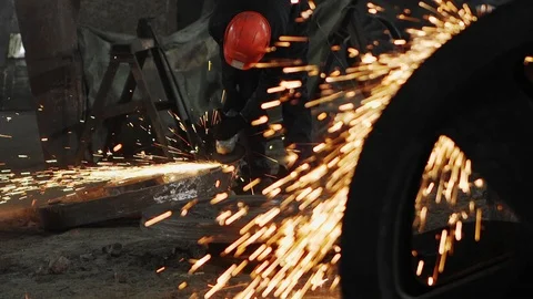 Man work with Metal processing factory. Sparks. Stock Footage 105566663
