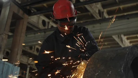 Man work with Metal processing factory. Sparks. Stock Footage 105566895