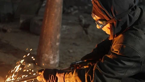 Man work with Metal processing factory. Sparks. Stock Footage 105567927