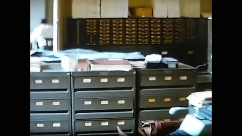 Man at work at the registry office year 1960s 動画素材 196154924
