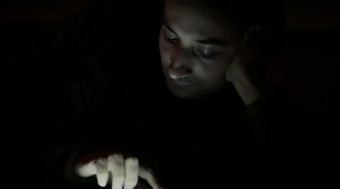 Man work with tablet in dark Stock Footage 56366030
