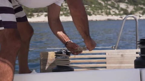 Man work with winch on the yacht Stock Footage 196810491
