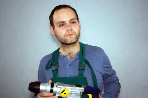 Man of worker and hammer drill Foto stock