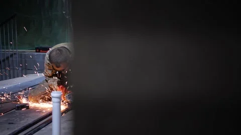 The man - worker grinds indoor Stock Footage 150481791