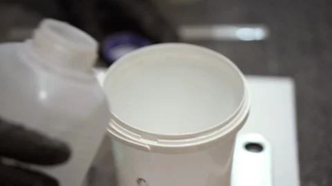 Man worker makes a round table in the carpentry shop. Close-up. Wood products fo Stock Footage 120693946