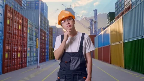 Man Worker Thinking Then Raising His Index Finger At Container Yard Warehouse Stock Footage 285171238