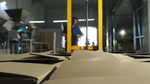 Man worker in uniform operates manual forklift in storehouse Stock-Footage 266281157