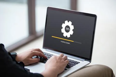 Man working and Installing update process with gearbox percentage progress Stock Photos