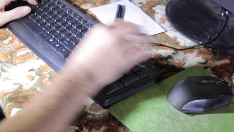 Man working and typing Stock Footage 90814372