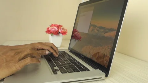 Man working on Apple MacBook Pro laptop Stock Footage 114649970