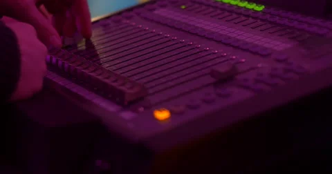Man working on audio mixer Stock Footage 58324156