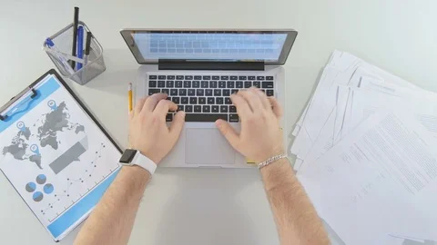Man is working behind a laptop Stock-Footage 81475646