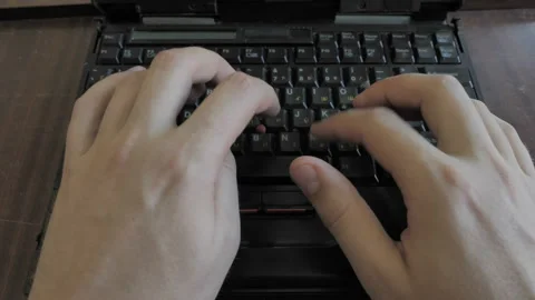 Man Working Behind Retro Vintage Laptop Computer. Top View  Video stock 137650448
