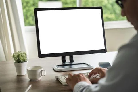 Man working Businessman using a desktop computer of the blank screen copyspac Foto stock