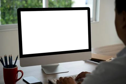 Man working Businessman using a desktop computer of the blank screen with han Stock Photos