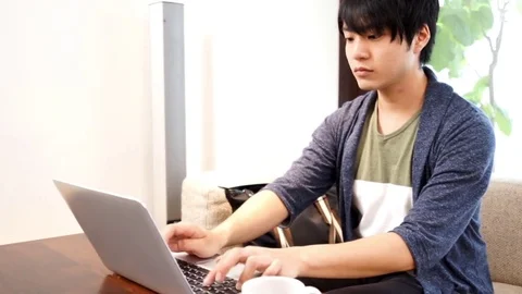 Man working at a cafe Stock Footage 72558423