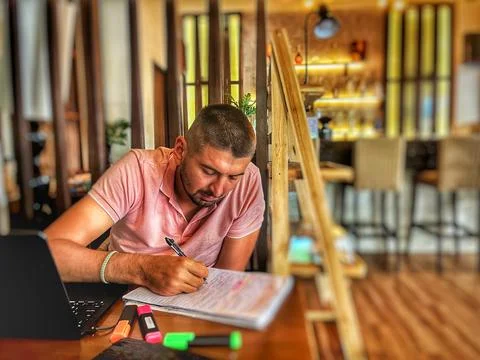 Man working in cafe Stock Photos