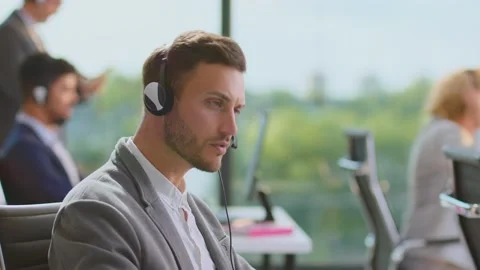 Man working in call centre 스톡 동영상 168275529