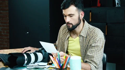 Man working with camera Stock Footage 92108631