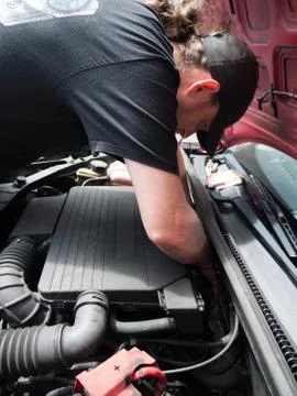 Man Working On a Car Stock Photos