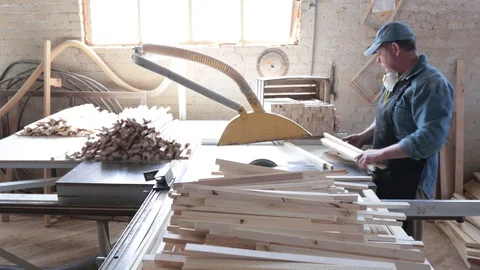Man working as carpenter in his own woodshop. Stock Footage 128120181