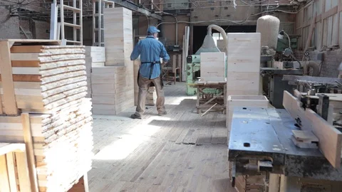 Man working as carpenter in his own woodshop. Stock Footage 128120371