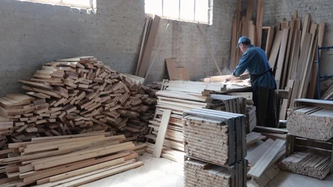 Man working as carpenter in his own woodshop. Stock Footage 128120420