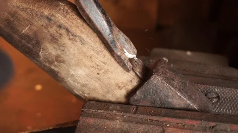 Man working in carpentry workshop. Making axe Stock Footage 101477949