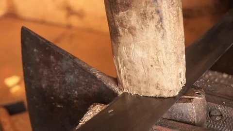 Man working in carpentry workshop. Making axe Stock Footage 101478122