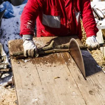Man working with circular saw blade Stock Photos