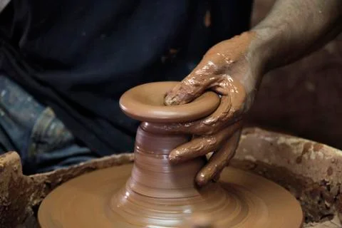 Man working the clay Stock Photos