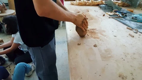 Man working with clay in a studio at the 12th International Eskisehir Terra Stock-Footage 104031956