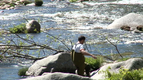 Man working on the cleaning of river walks by the shore Stock Footage 49058912