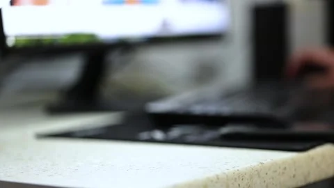 Man working at the computer and drinking water. Hydration in the process of w Stock Footage 152951716