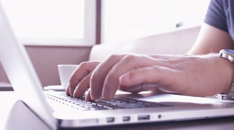 The man working at a computer in a cafe Stock Footage 50225789