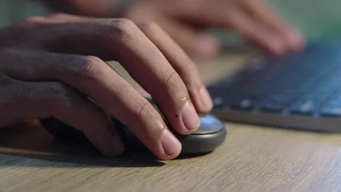 Man working on computer. Close up view of male hands on computer keyboard a.. Stock Footage 320061330